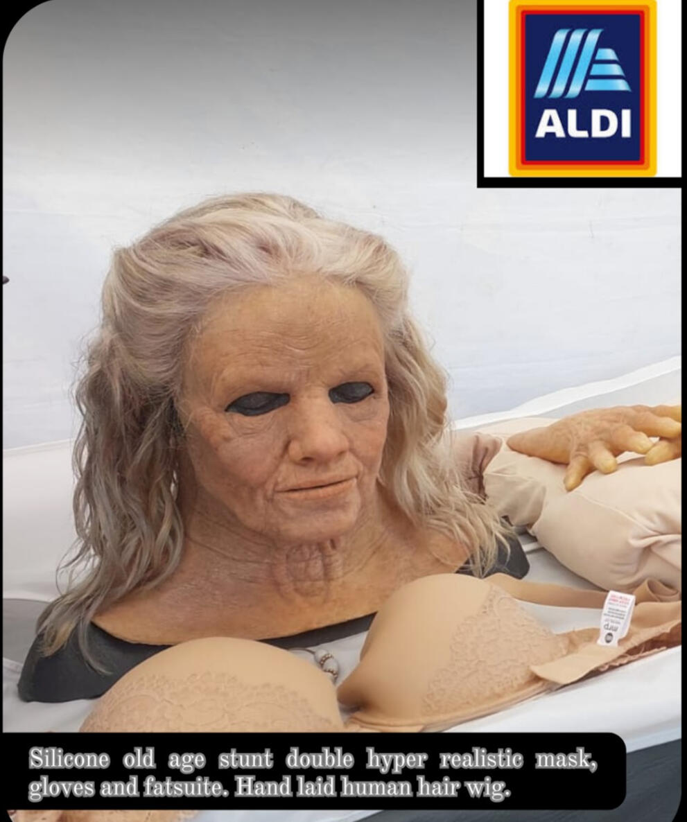 Realistic Face Mask : Replica face, hands, and wig for ALDI advert — prosthetics enabled completion after actress’s injury (2025).